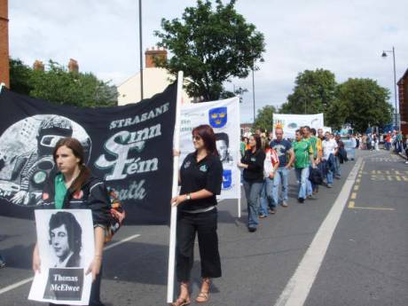 Strabane gra Shinn Fin hold banner proudly