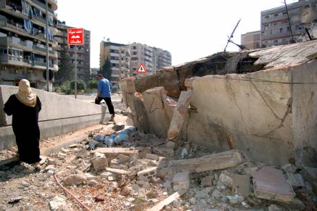 Women in rubble of Dahiyeh