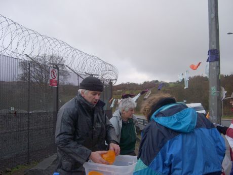 It's a hard slog for the workers in the camp to be ready for all new groups and lend a hand