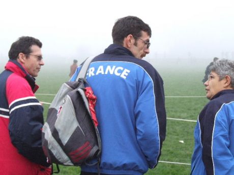 French visitors.  Are they discussing the runners or is it something else?