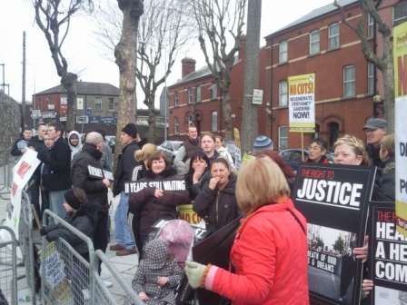 protesters gather outside new courts building