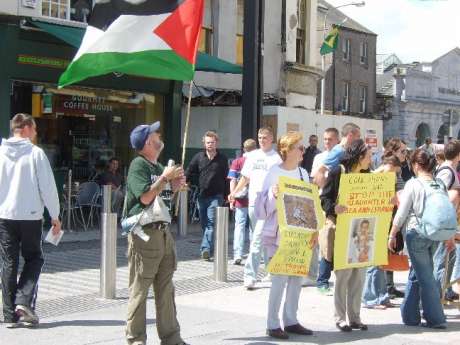 Palestinian flag flies in solidarity with the victims