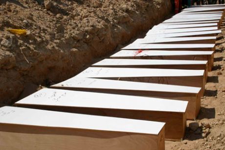 Thirty coffins were buried in a mass grave in Tyre on 29 July. (Hugh Macleod/IRIN)