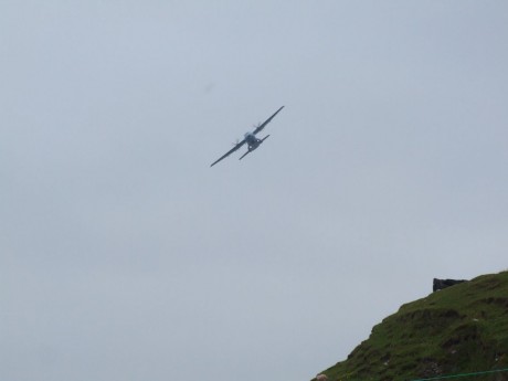 Shell's Air Corps Casa CN235 circling over camp & bay