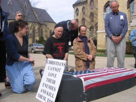  B Cussen, E Bloomer, M Walli & D Timmerman with coffin about to be arrested