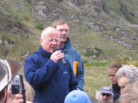 Christy Moore sings before the walk starts