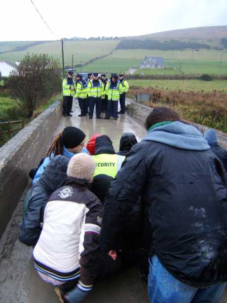 Police line up ready for action.