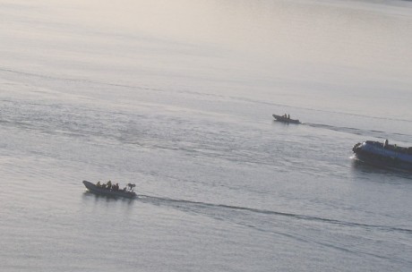 Irish naval outriders protect the US warship