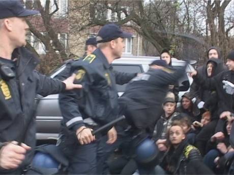 Beating of sitting protesters