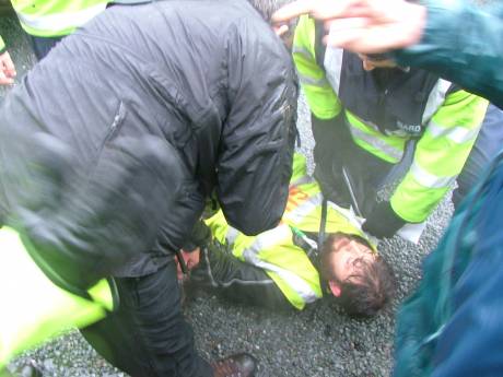 Garda unlawfully detain and assault local resident