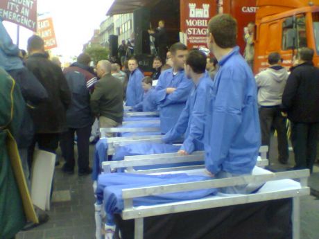 'Patients' lined up. Part of procession.