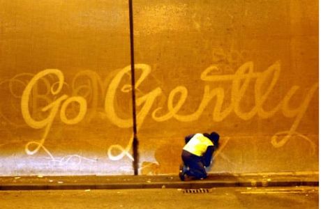 Paul Curtis creates his street art by *cleaning* the dirt and grime off of surfaces!