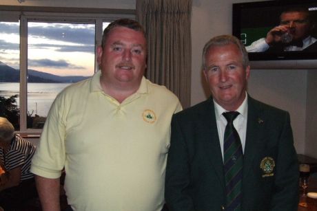 Danny Carr (left), winner of 2008 Captain's Prize in Greenore Golf Club pictured with club captain, Michael Shields, just before the presentation of the prizes on Sunday 31 August 2008.  Carlingford Lough may be seen in the window in the background.